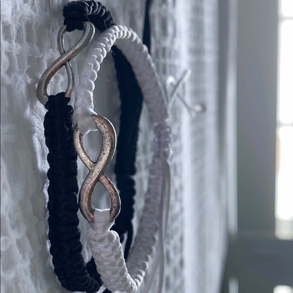 Adjustable infinity bracelet set, white and black.